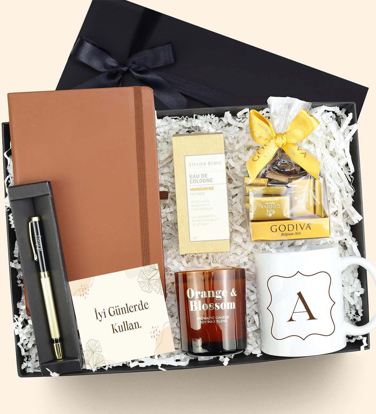 Kişiye Özel Defter & Kalem & Bardak & Atelier Rebul Kolonya & Mum & Godiva Napoliten Çikolata Premium Hediye Seti