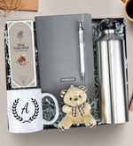 Gri Defter & Kalem & Çelik Matara & Kupa & Rebul Kolonya & Ayıcık Anahtarlık Hediye Seti