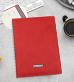 Kişiye Özel Kırmızı Spiralli Yeni Yıl Tarihli Ajanda & Kırmızı Renk Kulplu 280 ML Çelik Termos & Kırmızı Mat Roller Kalem & Ahşap Zeminli Mini Çam Ağacı & Godiva Napoliten Çikolata & Yılbaşı Temalı Metal Kutulu Mum Yılbaşı Hediye Seti