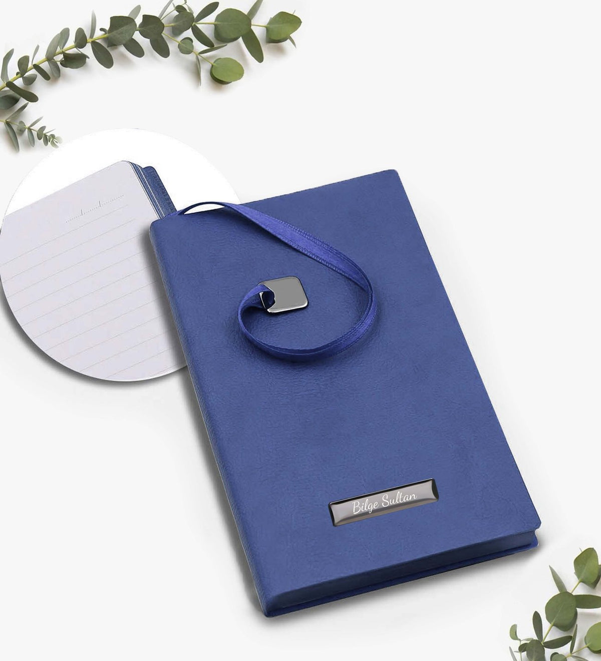 Kişiye Özel Mavi Yumuşak Kapaklı Not Defteri & Yılbaşı Baskılı Kupa & Yılbaşı Temalı Metal Kutulu Mum & Mavi Mat Roller Kalem Hediye Seti