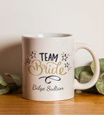 Kişiye Özel Team Bride Kupa & Bride To Be Kuşak & 2'li Teashop Bitki Çayı & Pastel Oje & Saten Toka & Lotus Çiçeği Mum & Bride Geçici Dövme Hediye Seti